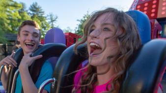 Teens riding Pandemonium at The Great Escape screaming and laughing.