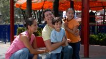 Family at Six Flags theme park.