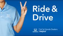 woman in blue collared shirt giving a peace sign