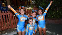 cheerleaders standing and posing
