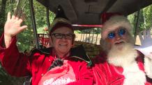 Santa and his trusted elf enjoying their summer break at The Great Escape.