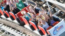 Guests riding Comet roller coaster at The Great Escape