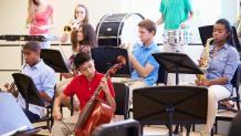 group of kids with instruments