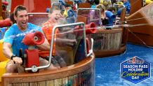Guests spraying water from on a ride