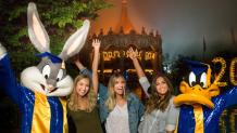 teens at Grad Nite with Bugs and Daffy in their graduation gowns