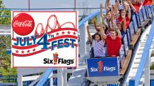 Riders on a wooden roller coaster