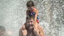 Father and daughter enjoy a water park