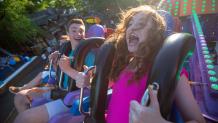 Teens riding Pandemonium at Six Flags Great Escape