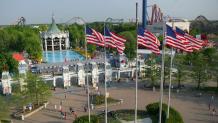 Salute to Service weekend with Six Flags Great America entrance and flags