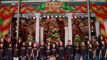 group of kids singing on stage