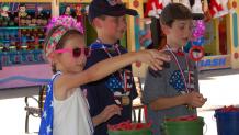 Kids playing ring toss at the Summer of Games