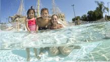 Children in the pool for swimming lessons
