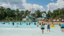 Guests in a Hurricane Harbor pool