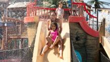 Mother and daughter on pirate slide