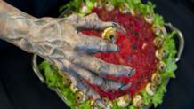 Zombie hand reacihng at Dining with the Dead