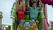 Guests riding new THE JOKER™ coaster