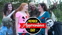 Two Guests Surrounded by Fright Fest Ghouls with Member Appreciation Logo