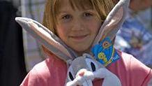 Child with Bugs Bunny Toy Child with Bugs Bunny Toy