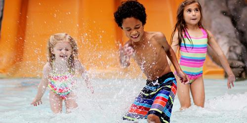 Kids splashing at the indoor waterpark at Six Flags Great Escape