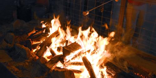 Toasting smores at Six Flags Over Texas