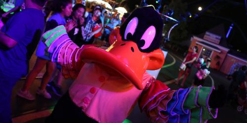 Daffy at night during Mardi Gras Festival in his festive attire