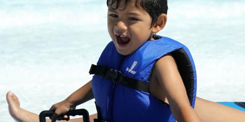 kid playing in water