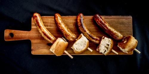 Sausage and roll on a stick
