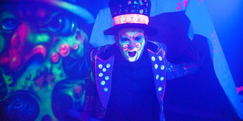 scary mad hatter character during fright fest at six flags