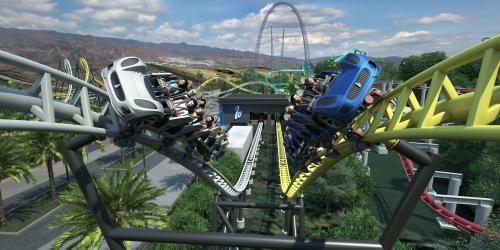 Coaster trains launching out of station.