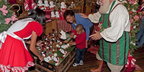 Mother and Son shopping with Santa and Santa Helper