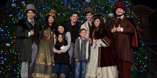 Group gathered with carolers