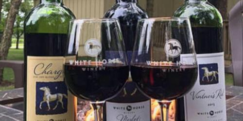 White horse winery wine bottles and glasses