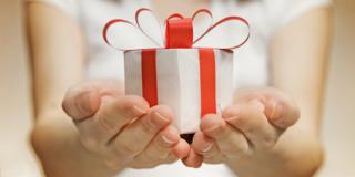 Woman holding a gift box