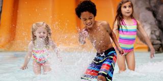 children splashing in water