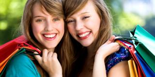 Two girls with shopping bags