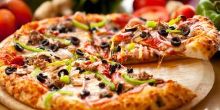 Pepperoni and vegetable pizza