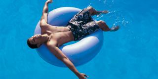 Water Park - Guest Relaxing in Tube Water Park - Guest Relaxing in Tube