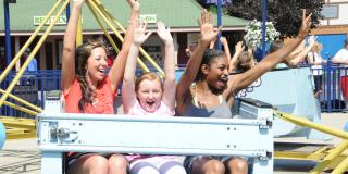 kids riding scrambler at the park