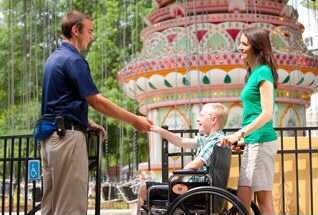 Person in wheelchair at Six Flags